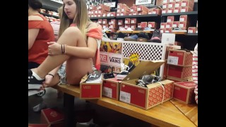 Candid voyeur thick blonde beautiful trying on sneakers
