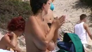 Voyeur cam caught bigtits beach milf lotioning
